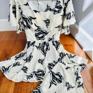 Elegant Black and White Leaf Print Mini Dress